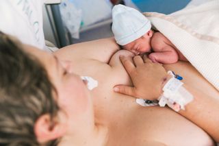 Mum breastfeeding baby